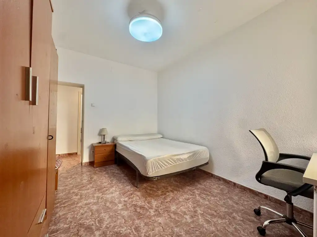 Bedroom of Flat for share in Córdoba