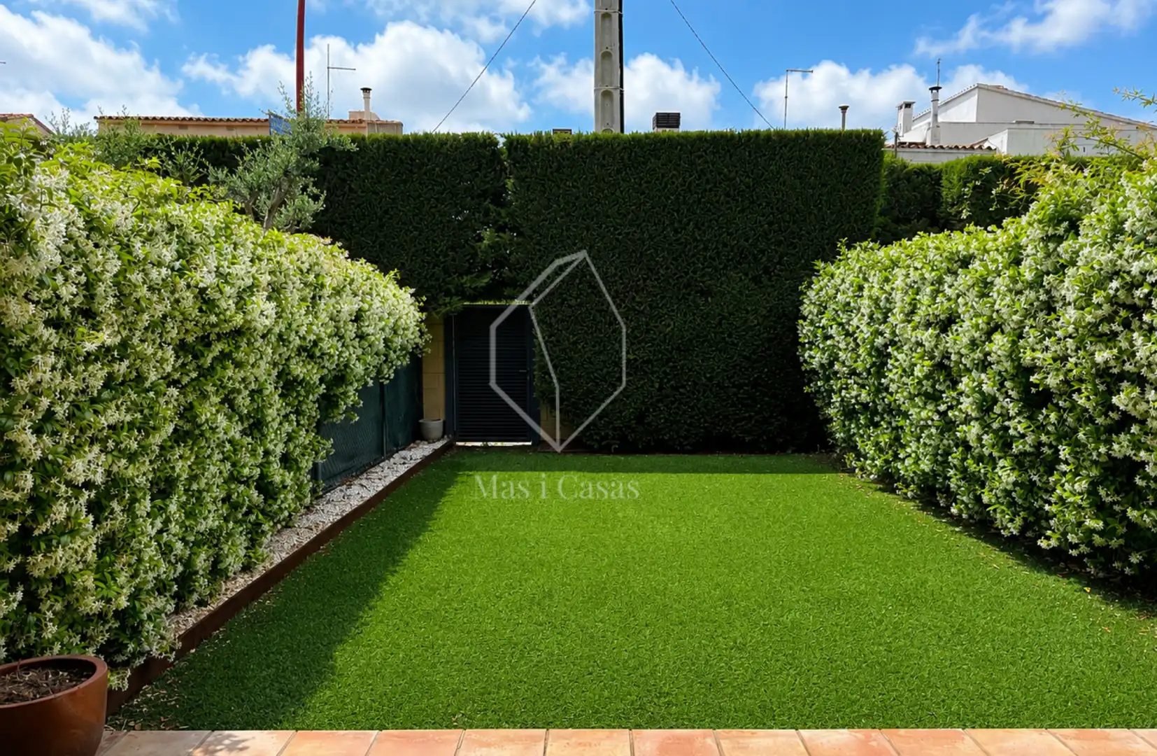 Garten von Einfamilien-Reihenhaus zum Verkauf in L'Escala mit Klimaanlage, Heizung und Privatgarten