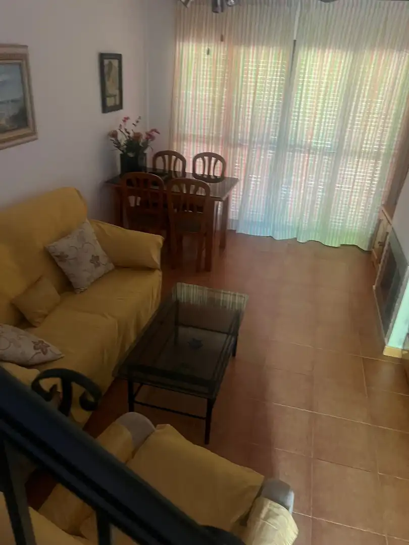 Sala de estar de Casa adosada en venta en Islantilla con Aire acondicionado y Calefacción