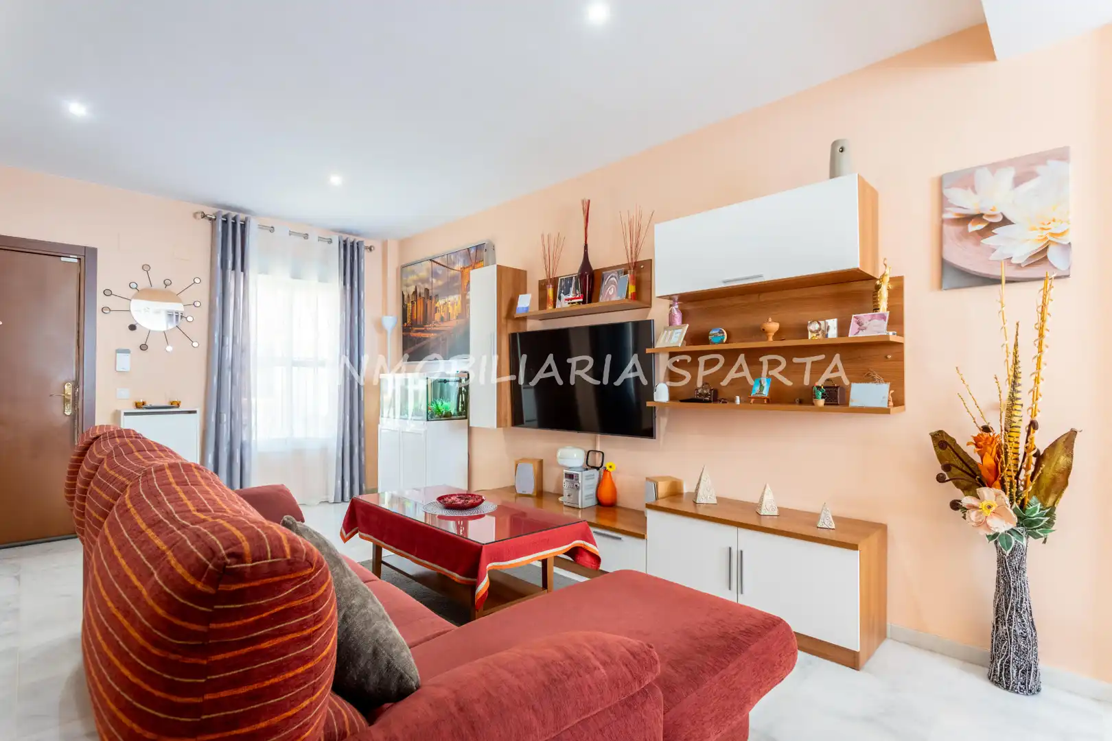 Sala de estar de Casa adosada en venta en Villanueva del Ariscal con Aire acondicionado, Calefacción y Jardín privado