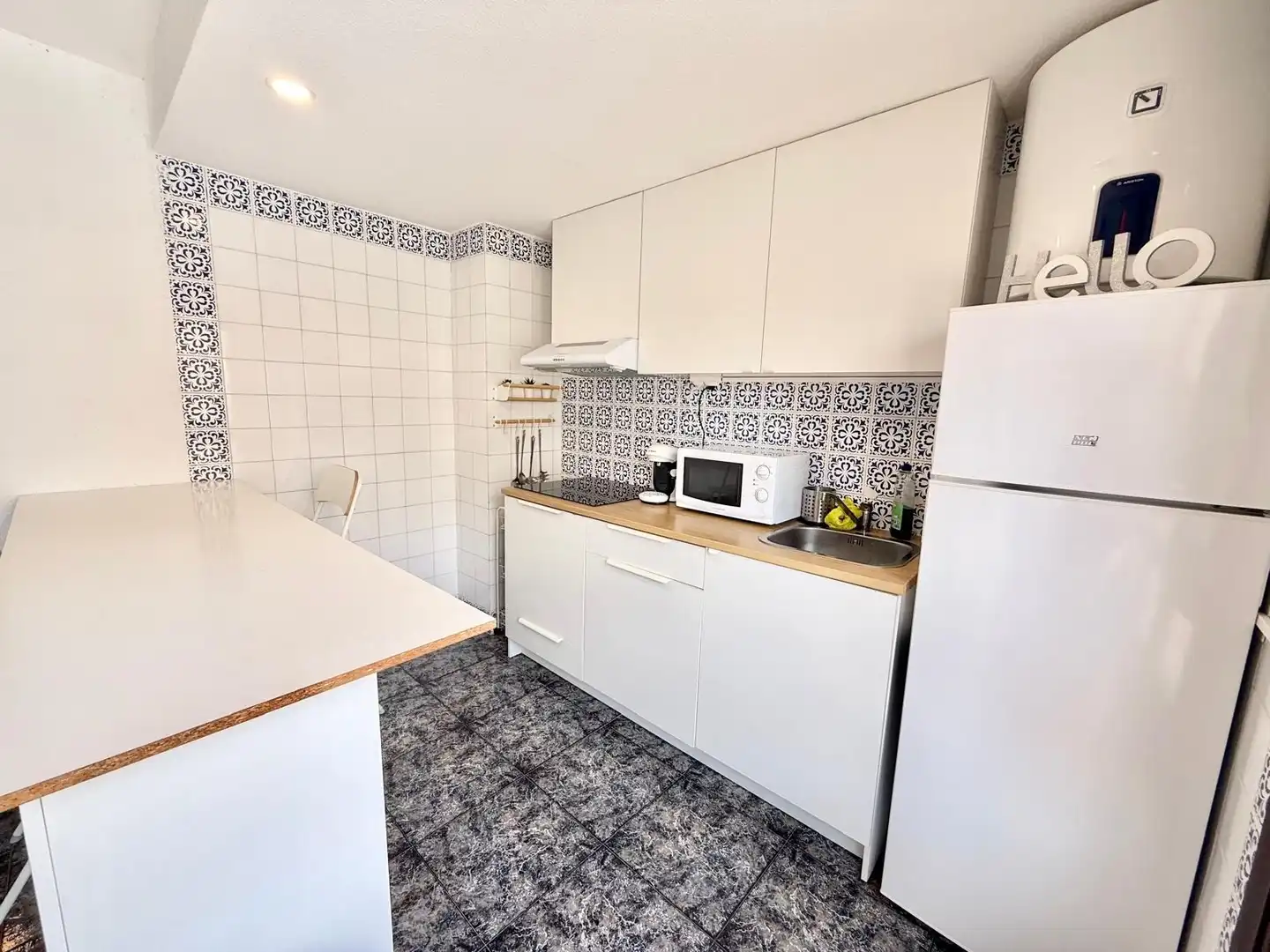 Cuina de Apartament de lloguer en La Manga del Mar Menor amb Aire condicionat, Calefacció i Piscina