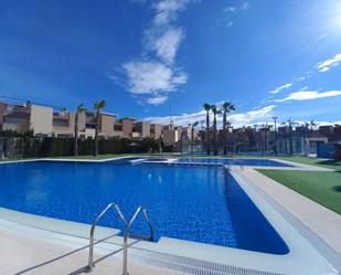 Swimming pool of Planta baja for sale in Torrevieja  with Air Conditioner, Heating and Terrace