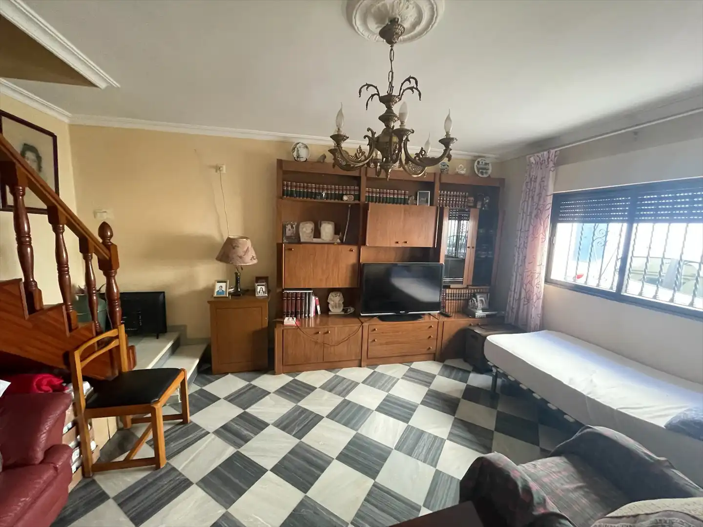 Sala d'estar de Casa adosada en venda en Coria del Río amb Aire condicionat i Terrassa