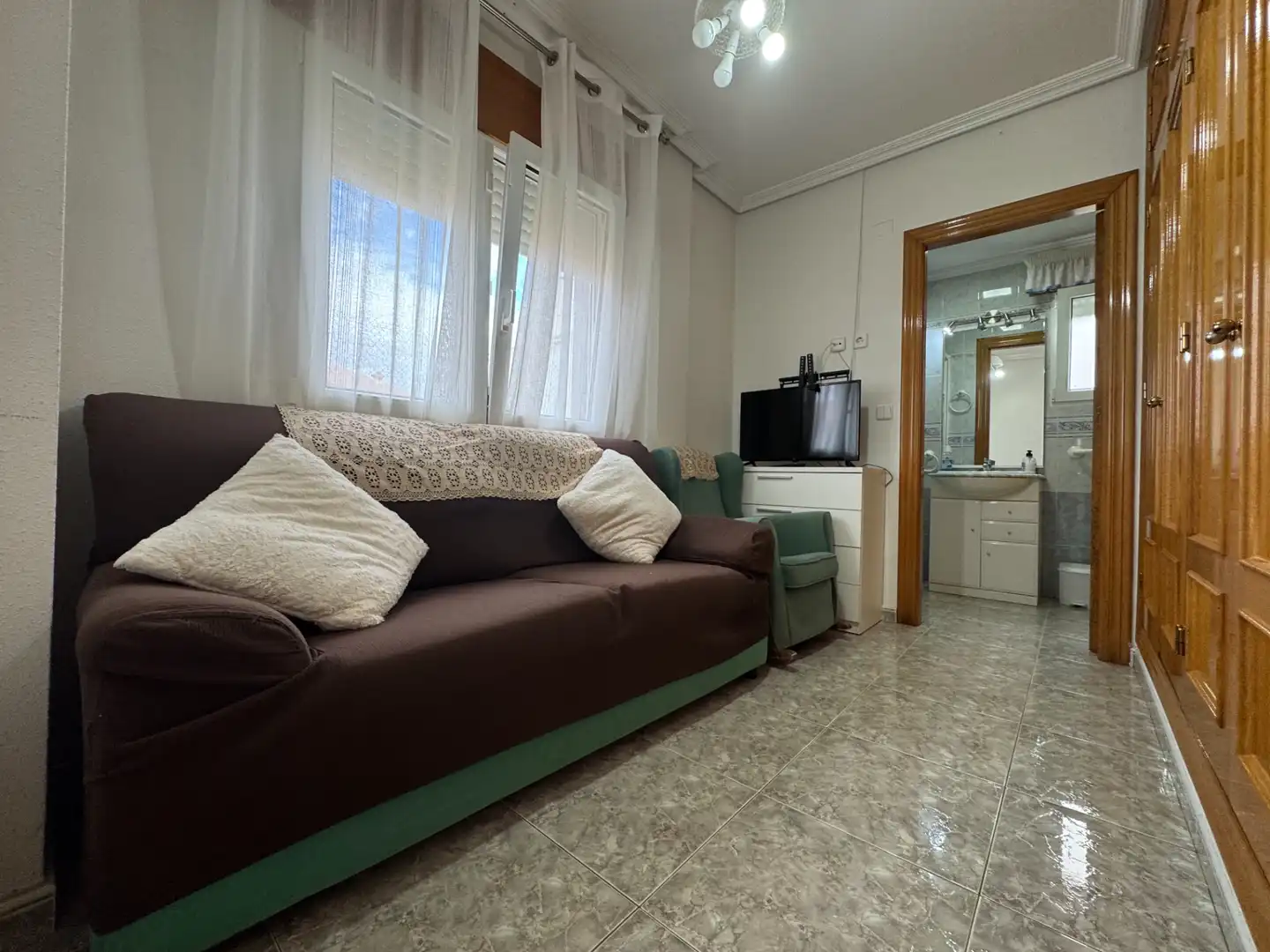 Sala d'estar de Casa adosada en venda en San Javier amb Aire condicionat, Calefacció i Jardí privat