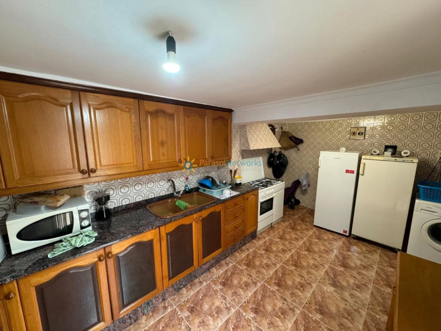 Cuina de Casa adosada en venda en Oliva amb Traster i Moblat