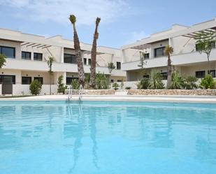 Swimming pool of Apartment for sale in Torrevieja  with Air Conditioner, Heating and Private garden