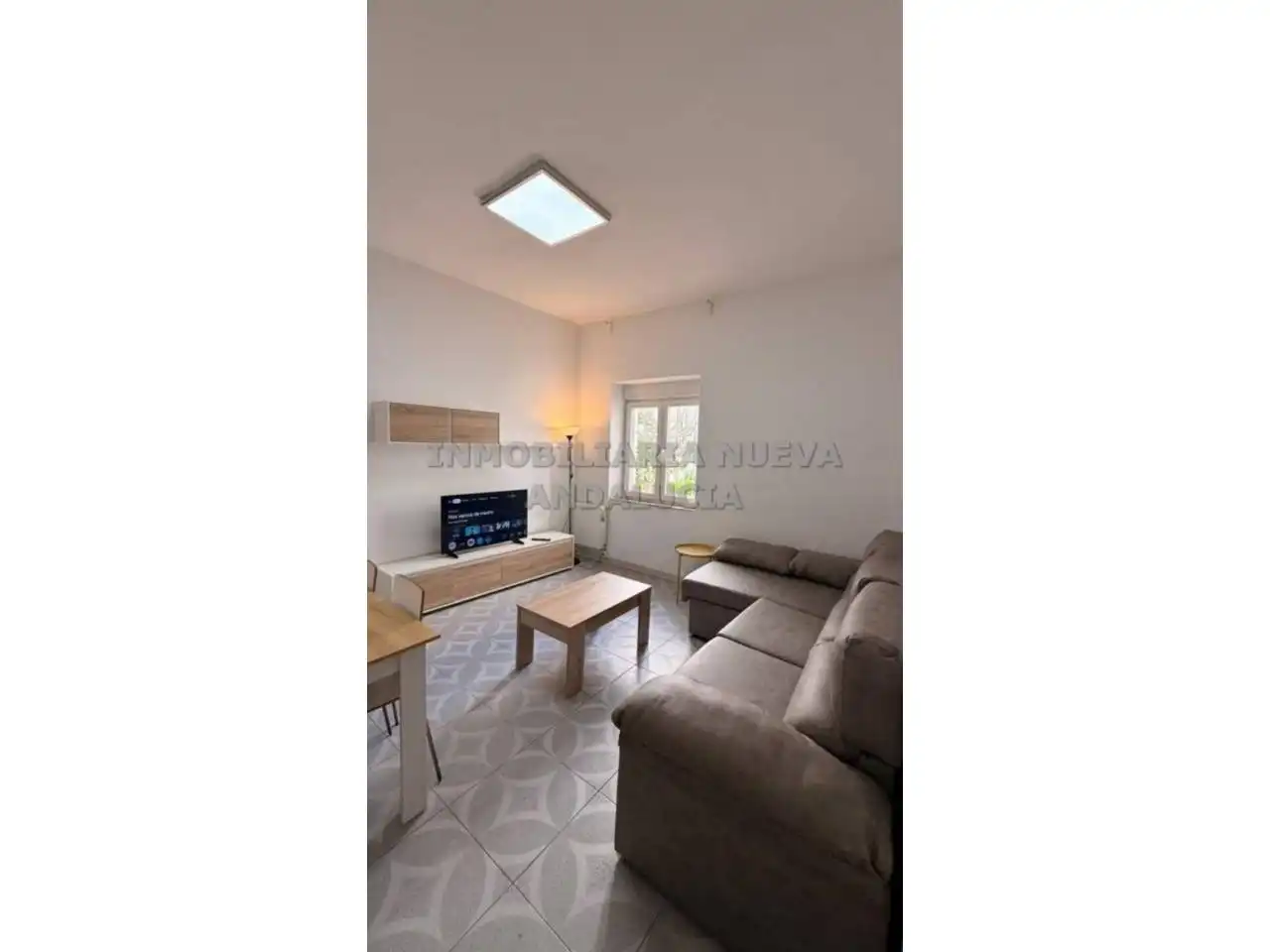 Sala d'estar de Pis de lloguer en Almería amb Aire condicionat i Moblat