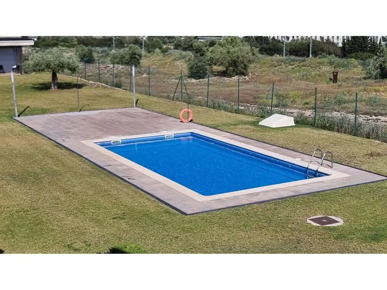 Swimming pool of Flat for sale in L'Ampolla  with Air Conditioner, Heating and Balcony
