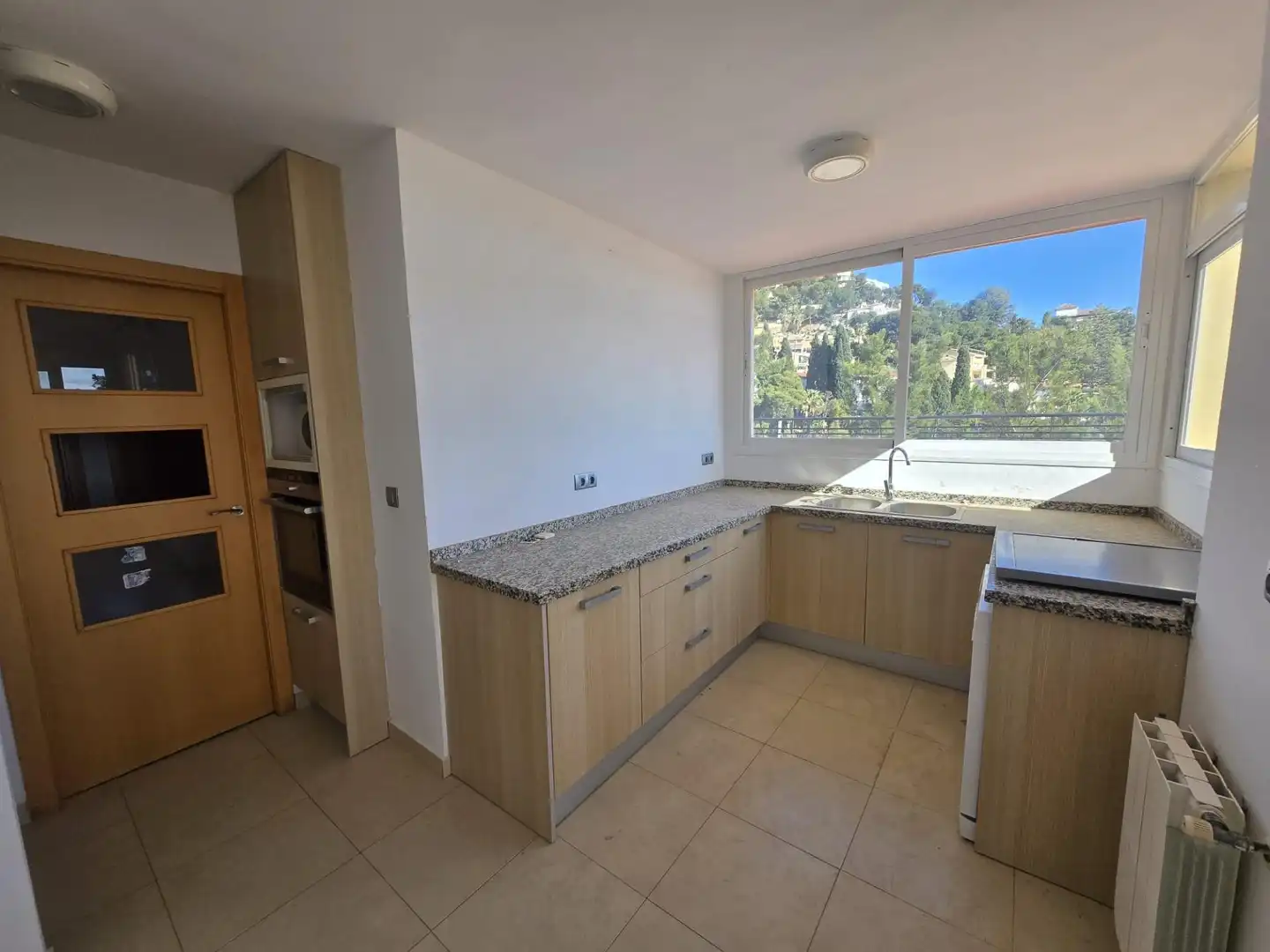 Kitchen of Flat for sale in Málaga  with Heating, Terrace and Storage room