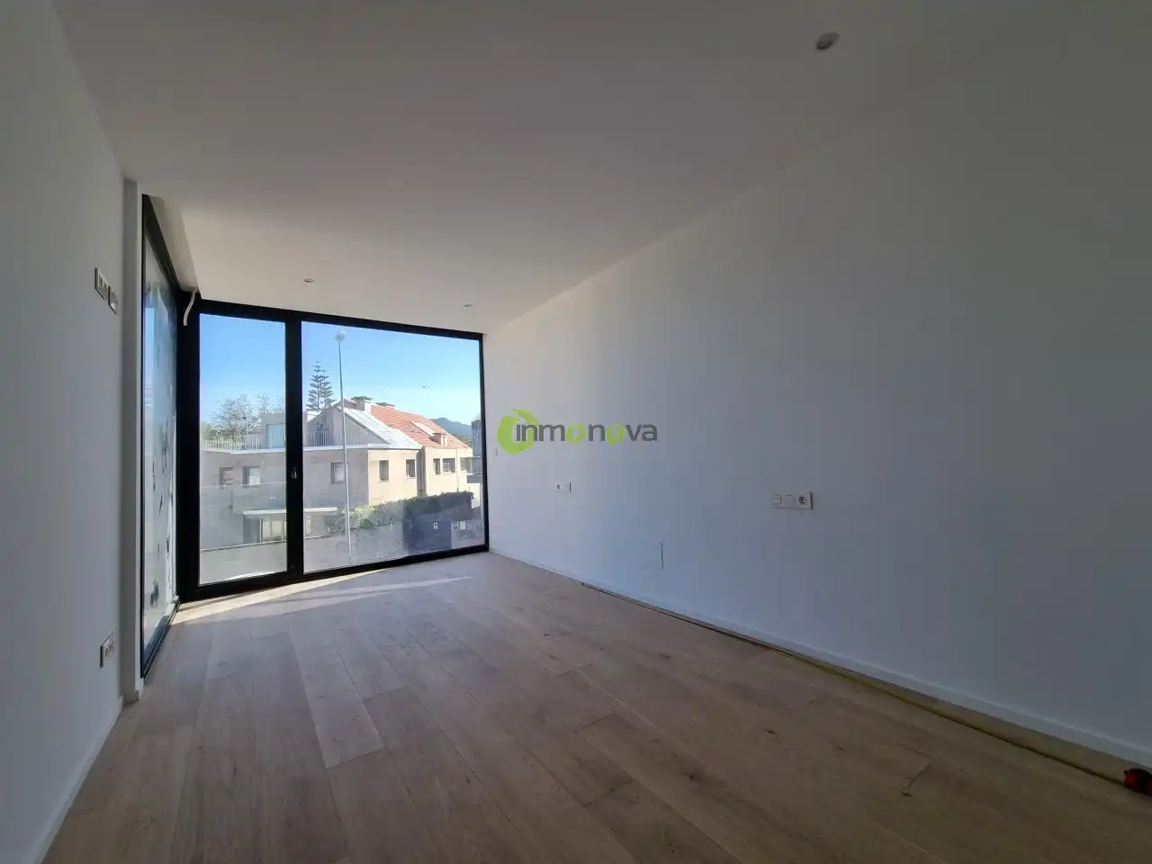 Sala de estar de Casa adosada en venta en Nigrán con Calefacción, Jardín privado y Terraza