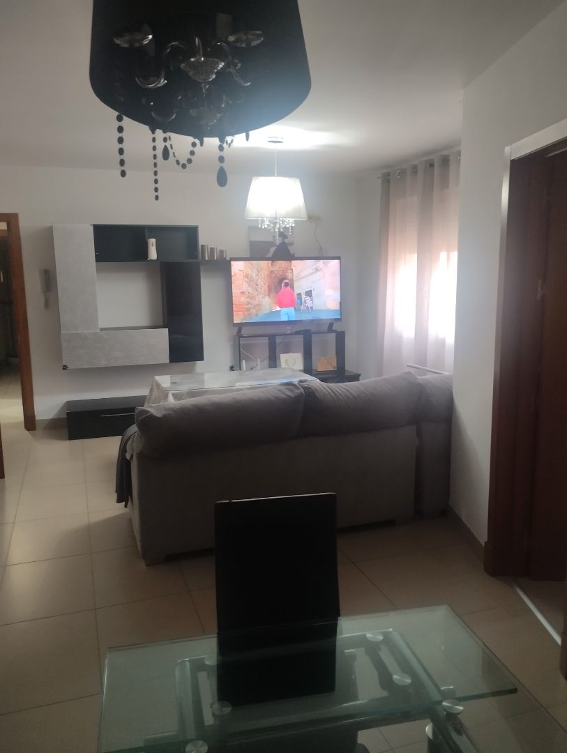 Living room of Flat to rent in La Algaba  with Air Conditioner, Storage room and Furnished