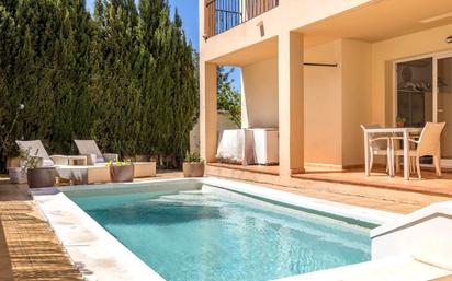 Swimming pool of Single-family semi-detached for sale in Santa Eulària des Riu  with Air Conditioner, Private garden and Terrace