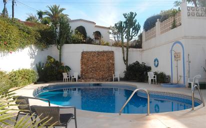 Piscina de Casa adosada en venda en Vélez-Málaga amb Aire condicionat, Jardí privat i Terrassa