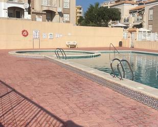 Swimming pool of Duplex for sale in Torrevieja  with Air Conditioner, Heating and Terrace