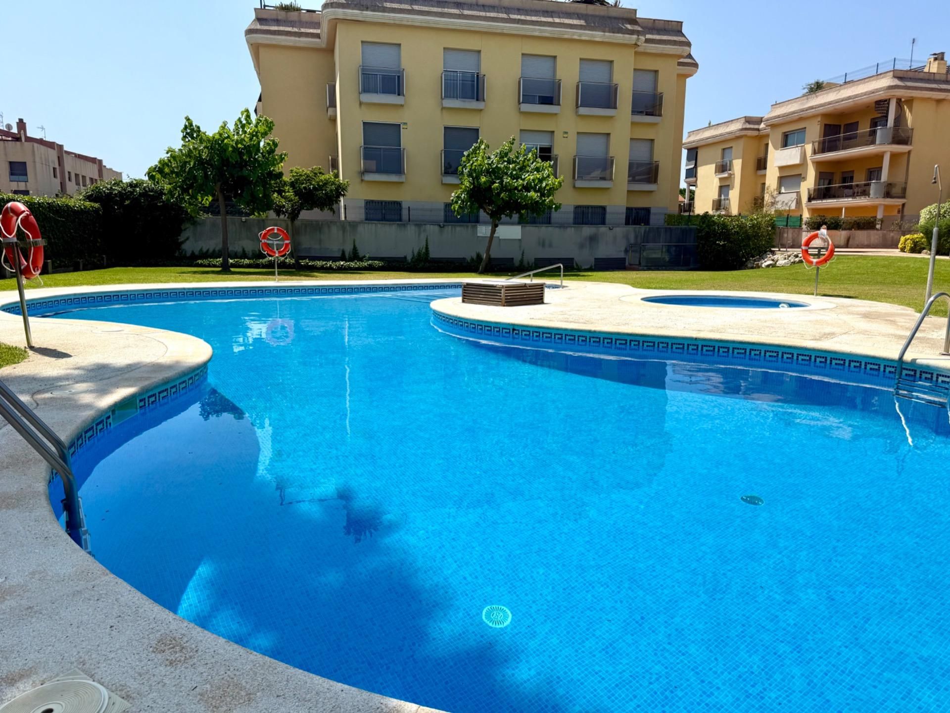 Swimming pool of Planta baja for sale in Cubelles  with Air Conditioner, Heating and Terrace