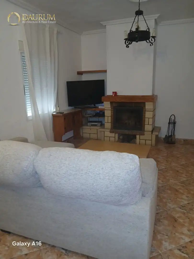 Sala d'estar de Casa o xalet en venda en Elche / Elx amb Aire condicionat, Terrassa i Traster