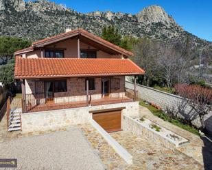 Vista exterior de Casa o xalet en venda en La Cabrera amb Calefacció, Jardí privat i Terrassa