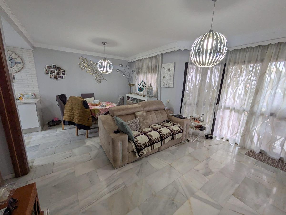Sala de estar de Casa adosada en venta en Torremolinos con Aire acondicionado, Calefacción y Terraza