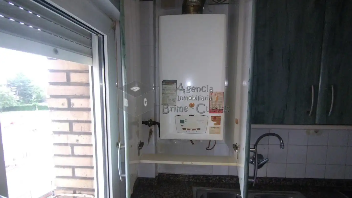 Kitchen of Flat for sale in Gijón   with Heating, Parquet flooring and Terrace