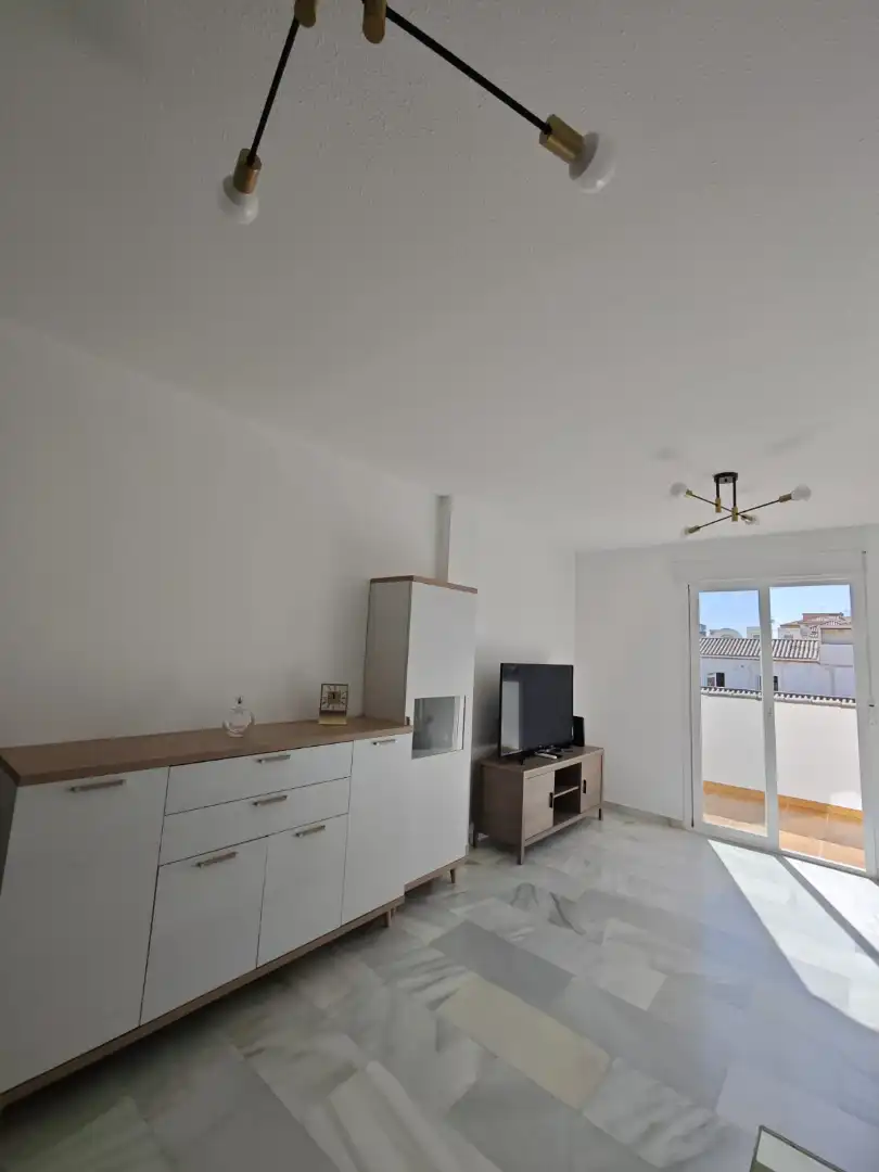 Sala d'estar de Àtic en venda en Vélez-Málaga amb Aire condicionat, Terrassa i Moblat
