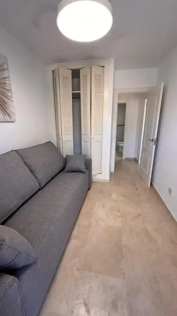 Sala de estar de Dúplex de alquiler en Calpe / Calp con Aire acondicionado, Jardín privado y Parquet