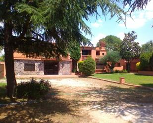 Vista exterior de Finca rústica en venda en Caldes de Malavella amb Aire condicionat, Jardí privat i Terrassa