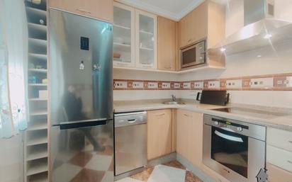 Kitchen of Flat for sale in Langreo  with Heating, Terrace and Storage room