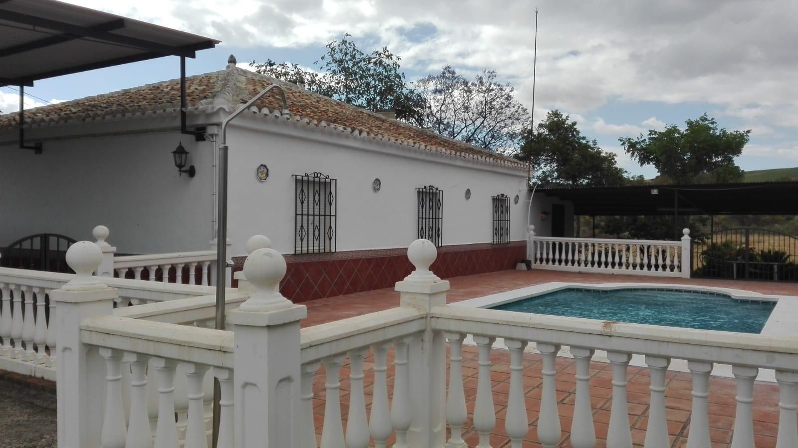 Exterior view of House or chalet for sale in Pizarra  with Private garden, Terrace and Storage room