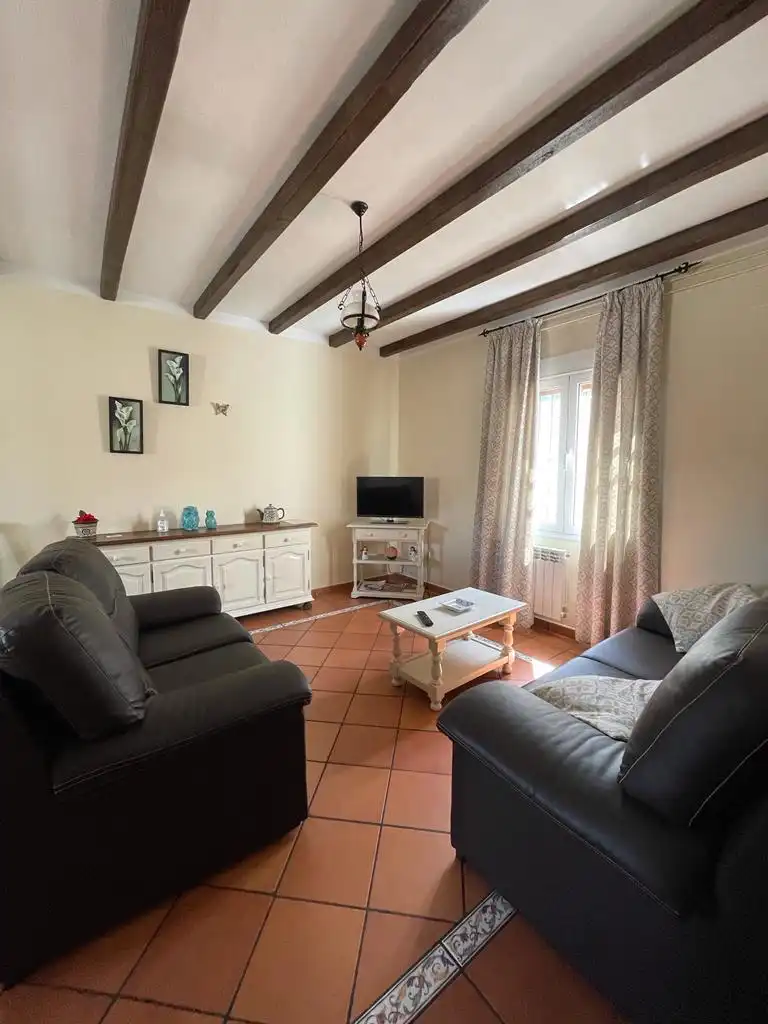 Sala de estar de Casa adosada de alquiler en Montejaque con Amueblado