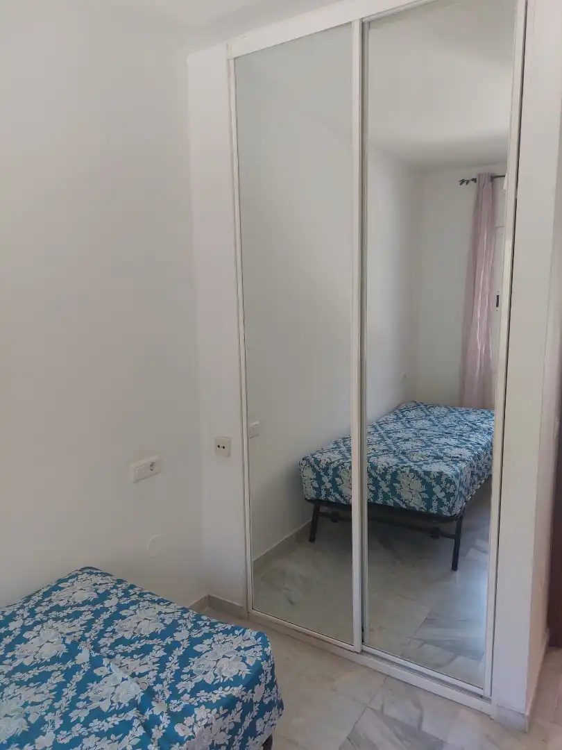 Habitación de Casa adosada de alquiler en Benalmádena con Aire acondicionado, Terraza y Amueblado