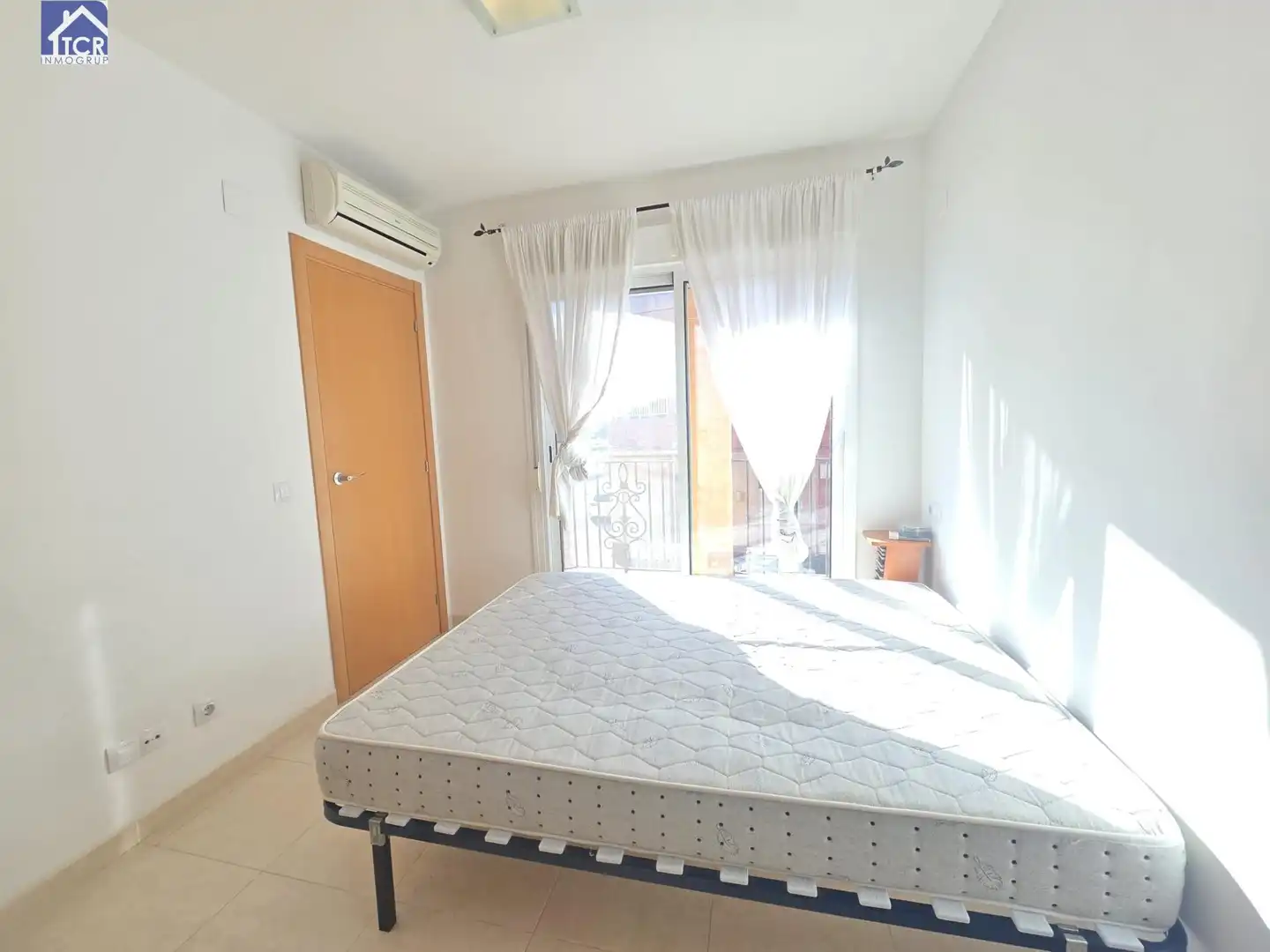 Schlafzimmer von Wohnung zum Verkauf in Camarles mit Klimaanlage, Balkon und Gemeinschaftspool