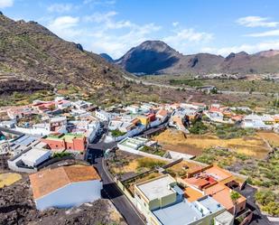 Vista exterior de Casa o xalet en venda en Santiago del Teide amb Aire condicionat, Jardí privat i Terrassa