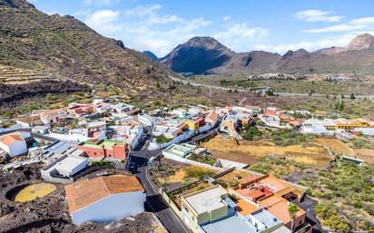 Exterior view of House or chalet for sale in Santiago del Teide  with Air Conditioner, Private garden and Terrace