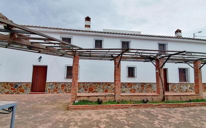 Exterior view of House or chalet for sale in Villanueva del Trabuco  with Heating, Private garden and Storage room