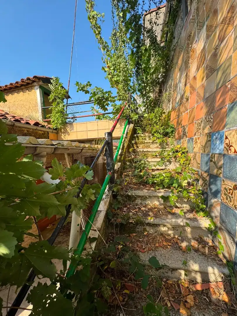 Vista exterior de Casa adosada en venta en San Martín del Rey Aurelio con Terraza