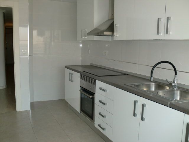 Kitchen of Flat to rent in Torrent  with Air Conditioner and Oven