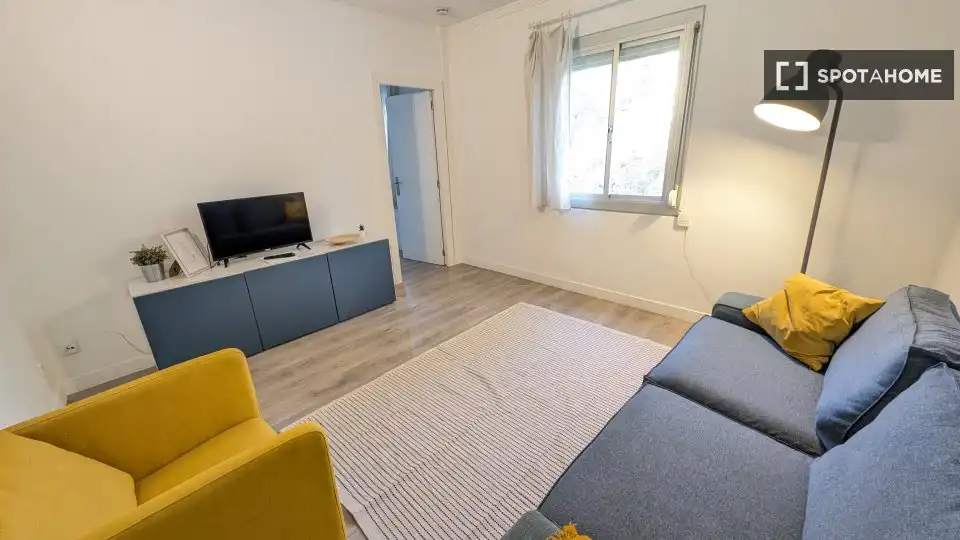 Sala de estar de Apartamento para compartir en Barcelona con Aire acondicionado, Terraza y Amueblado