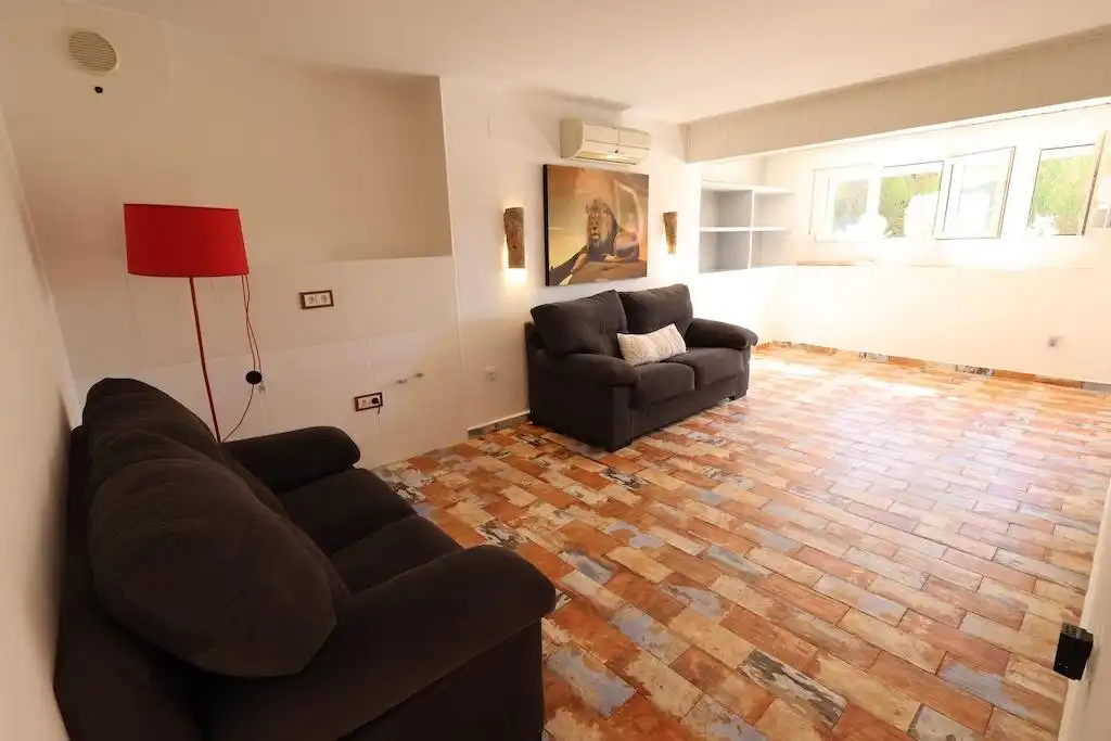 Sala d'estar de Casa o xalet en venda en Orihuela amb Aire condicionat, Jardí privat i Terrassa