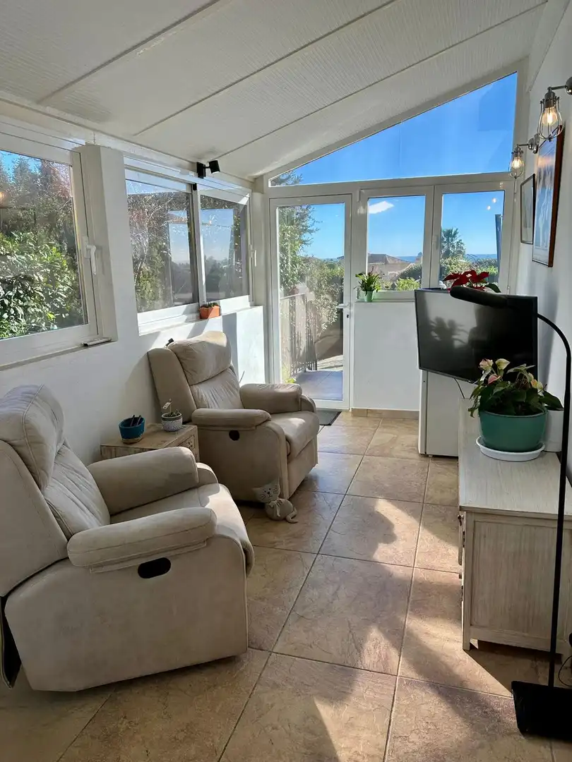 Living room of Houses for sale in Estepona  with Air Conditioner, Private garden and Terrace