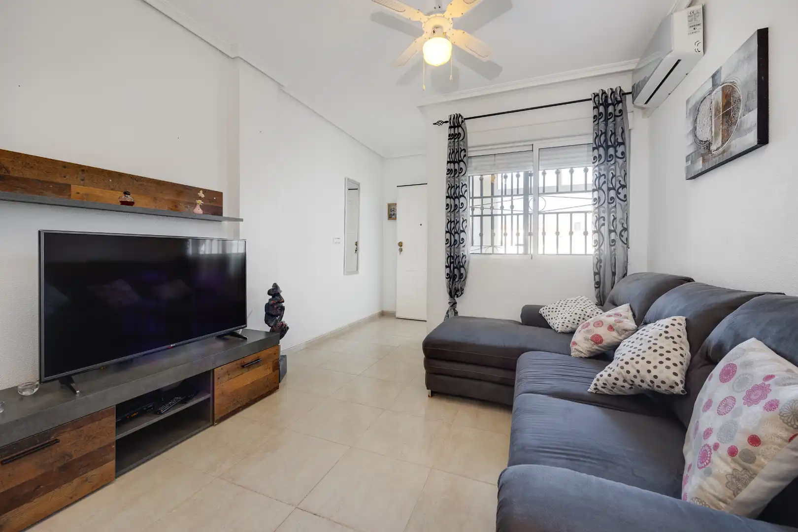 Sala d'estar de Pis en venda en Orihuela amb Aire condicionat, Jardí privat i Terrassa