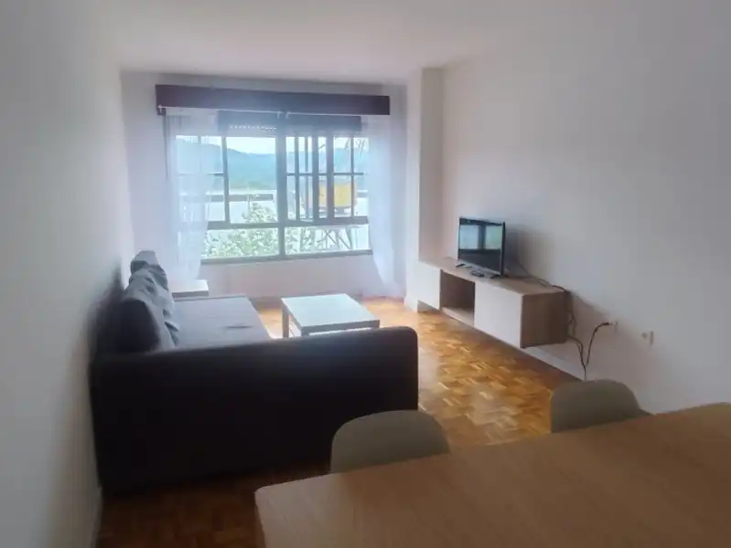 Sala d'estar de Pis de lloguer en Muros de Nalón amb Calefacció, Moblat i Forn
