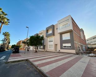 Exterior view of Single-family semi-detached for sale in Roquetas de Mar  with Community pool