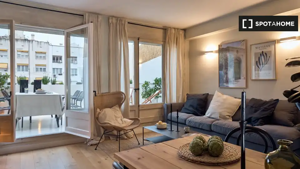 Sala d'estar de Apartament per a compartir en Sarrià - Sant Gervasi