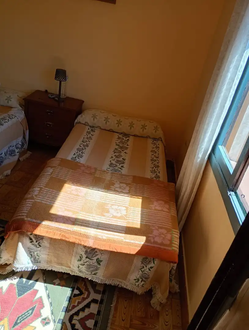 Habitación de Casa adosada en venta en Pravia con Calefacción, Terraza y Trastero