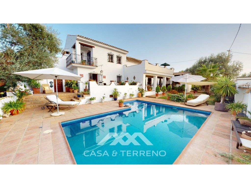 Exterior view of House or chalet for sale in Villanueva del Trabuco  with Air Conditioner, Private garden and Terrace