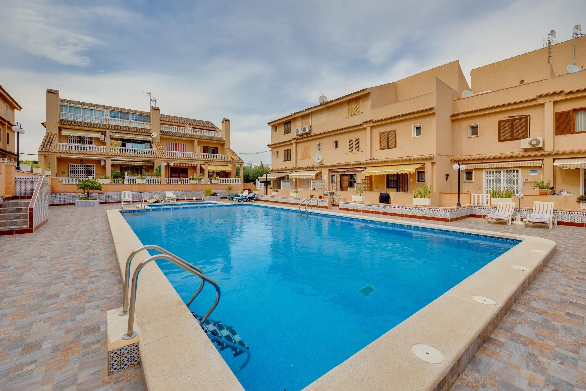Swimming pool of Single-family semi-detached for sale in Torrevieja  with Private garden, Terrace and Balcony