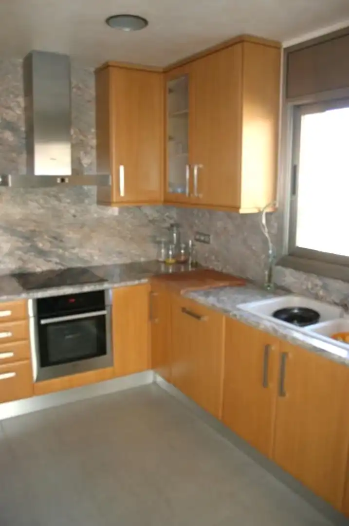Cocina de Casa o chalet en venta en L'Aldea con Aire acondicionado, Jardín privado y Parquet