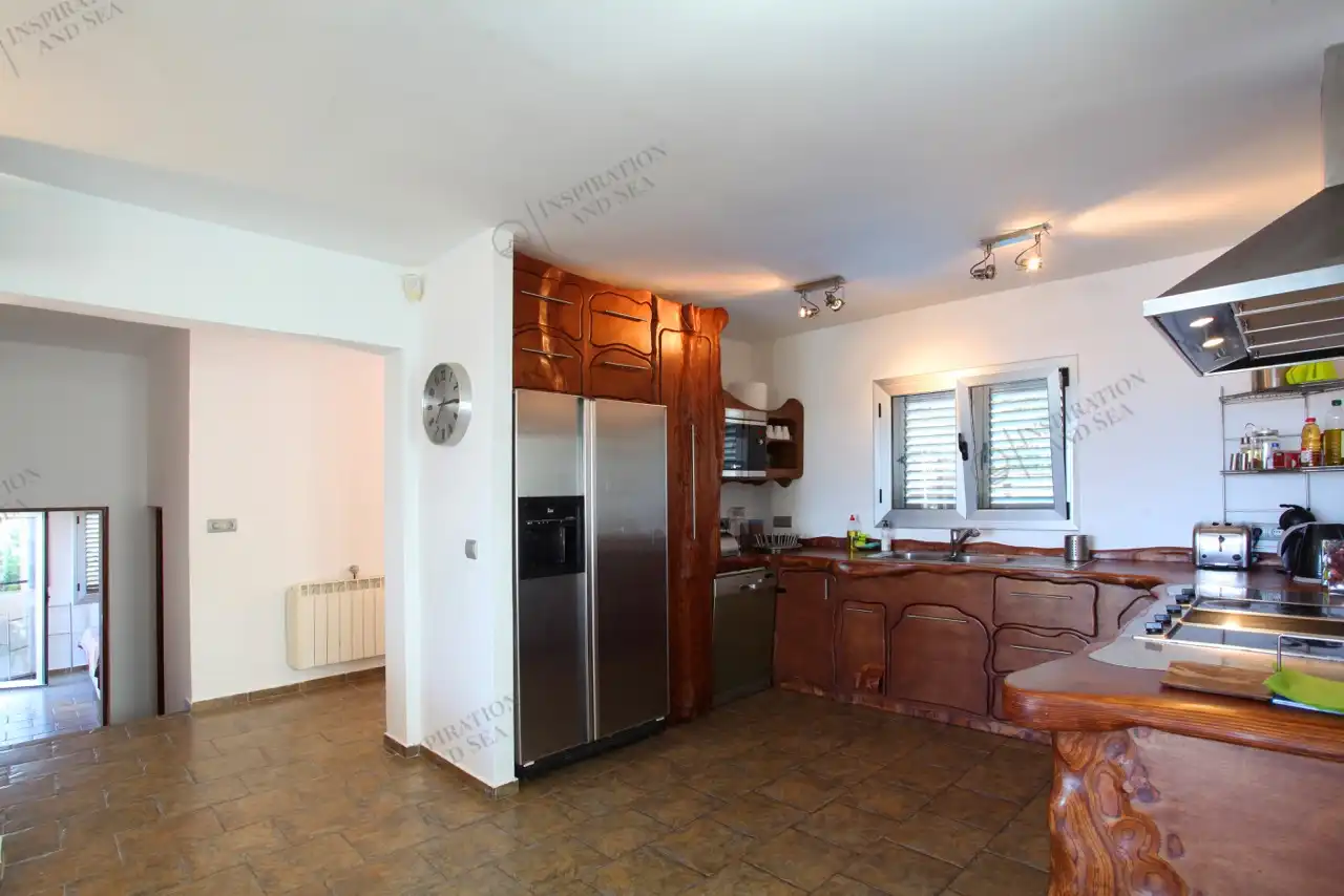Cuina de Casa o xalet de lloguer en Santa Eulària des Riu amb Aire condicionat, Jardí privat i Terrassa