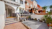 Exterior view of Single-family semi-detached for sale in Torrevieja  with Air Conditioner, Terrace and Furnished