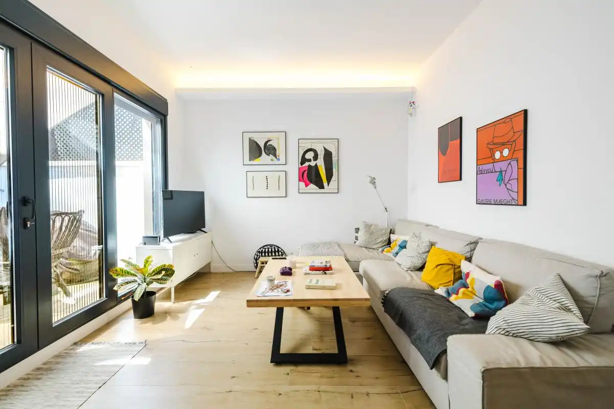 Sala de estar de Casa adosada en venta en Málaga con Aire acondicionado, Calefacción y Jardín privado
